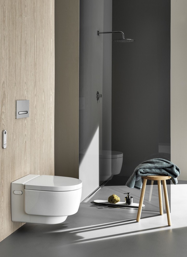 Geberit AquaClean Mera Dusch-WC kombiniert mit der Betätigungsplatte Geberit Sigma50.