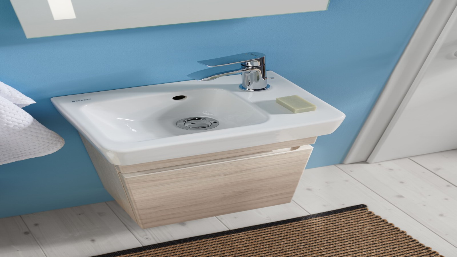 Geberit Renova Plan Handwaschbecken mit Unterschrank, Hahnloch seitlich